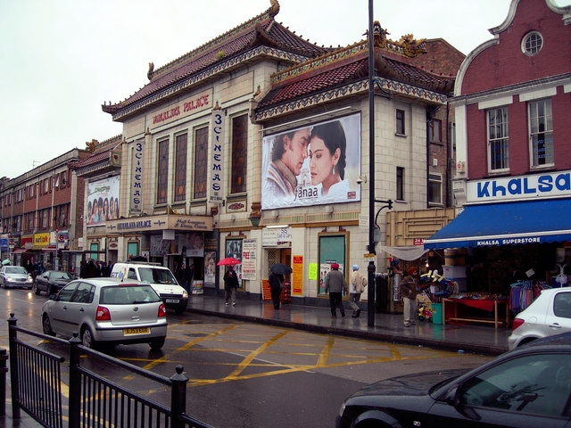 A building with a large advertisement on the side of it.